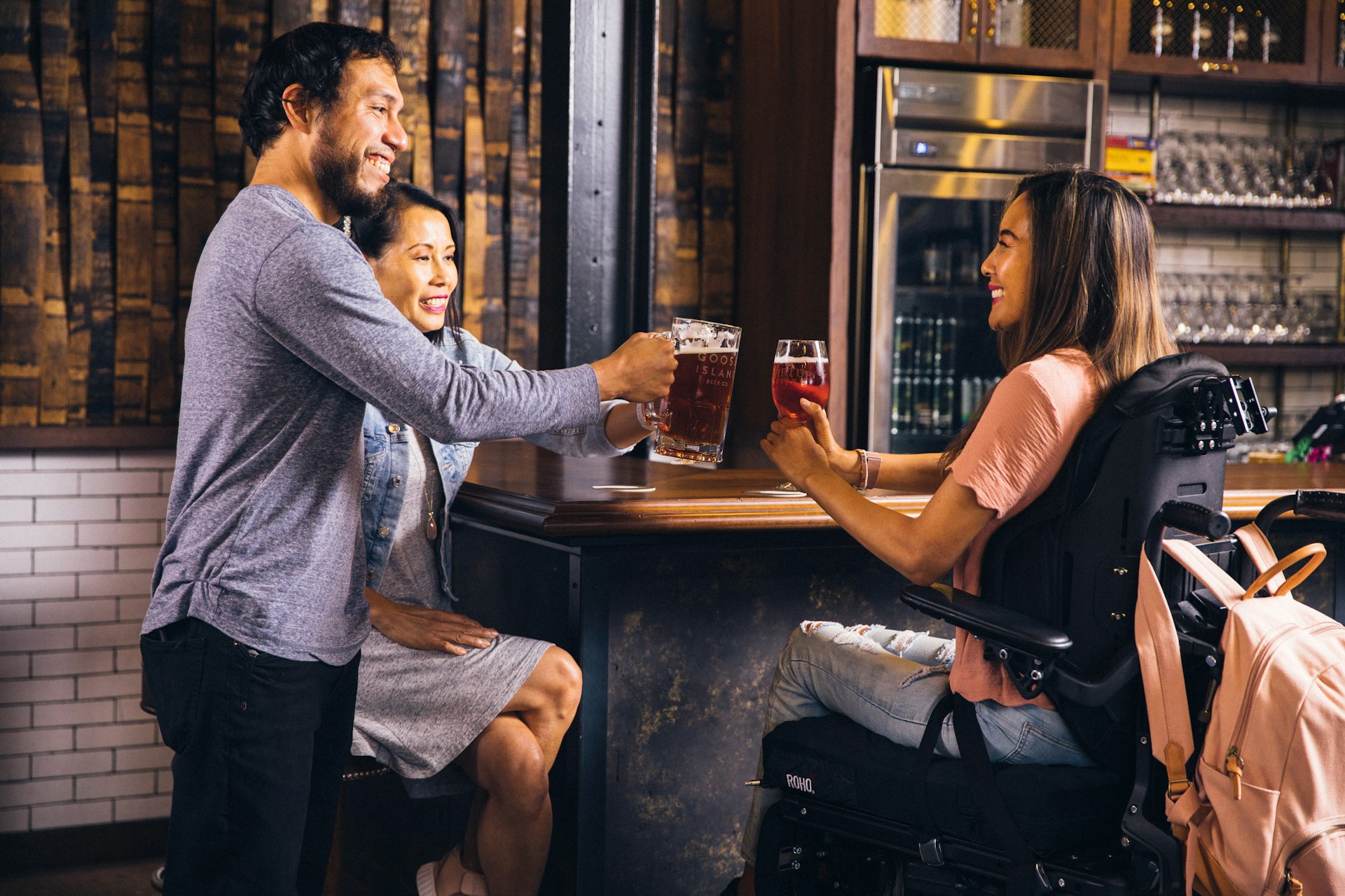 shallow focus photo of woman holding footed wine glass